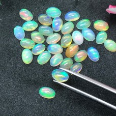 Natural Ethiopian opal 4x3mm oval cabochon